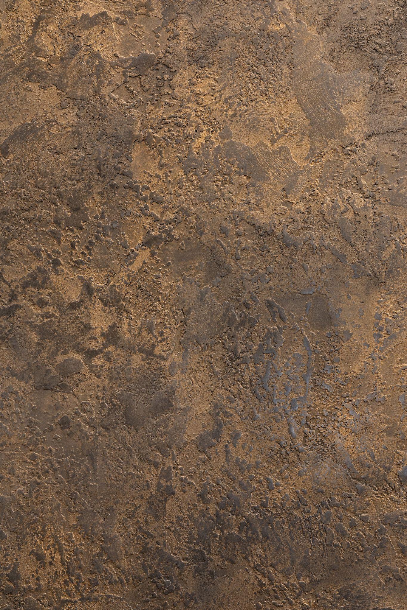 Pietra Intonaco — Stone-textured Italian plaster.